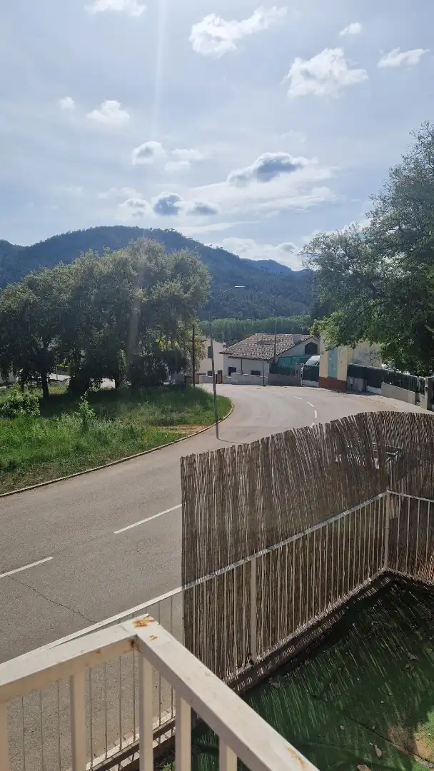 Vista exterior de Casa adosada en venda en Santa Coloma de Farners amb Calefacció, Jardí privat i Parquet