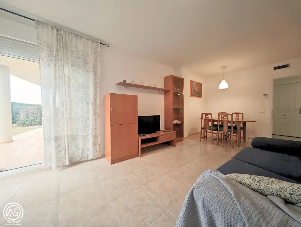 Sala de estar de Apartamento de alquiler en Mont-roig del Camp con Aire acondicionado, Calefacción y Jardín privado