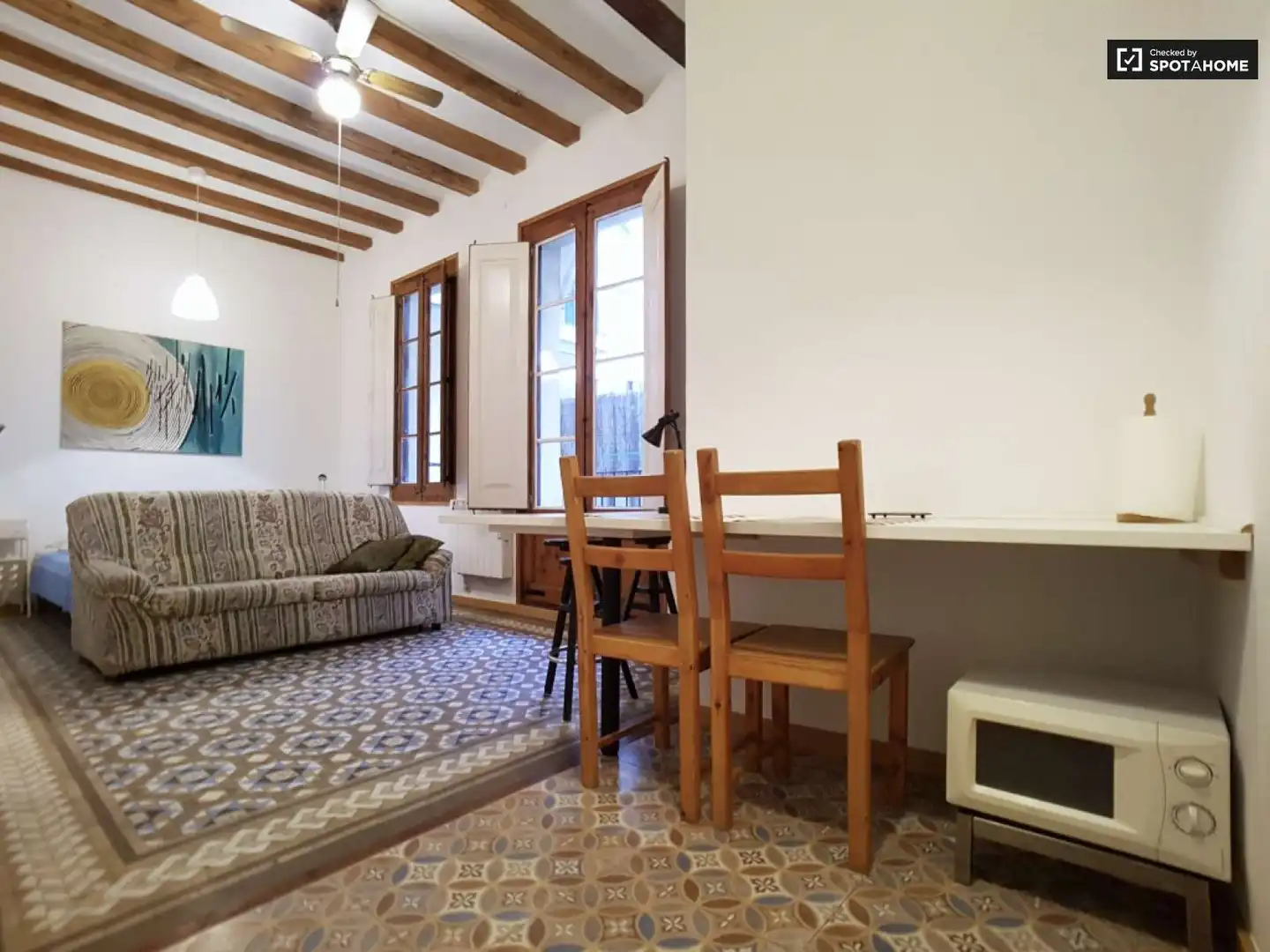 Sala de estar de Estudio para compartir en Barcelona con Aire acondicionado, Calefacción y Terraza