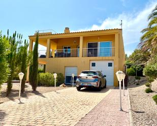 Vista exterior de Casa o xalet en venda en L'Ampolla amb Aire condicionat, Terrassa i Piscina