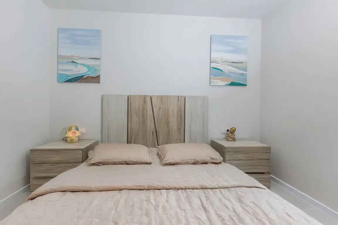 Habitación de Apartamento de alquiler en Dénia con Aire acondicionado, Jardín privado y Terraza