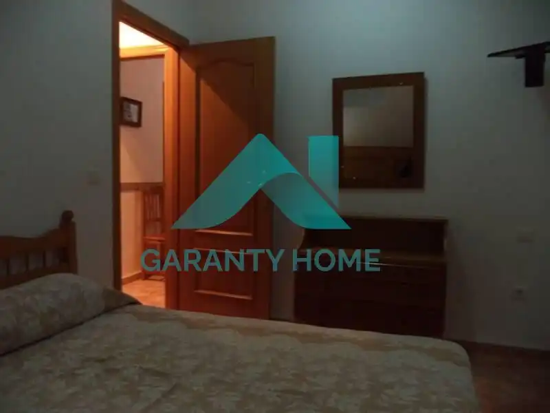 Dormitori de Apartament de lloguer en Cáceres amb Aire condicionat i Moblat