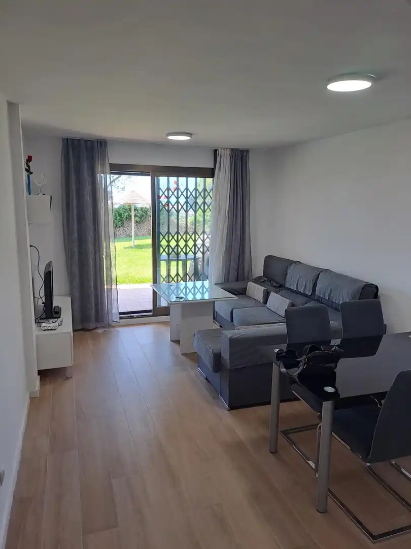 Sala de estar de Planta baja en venta en El Ejido con Jardín privado, Terraza y Amueblado