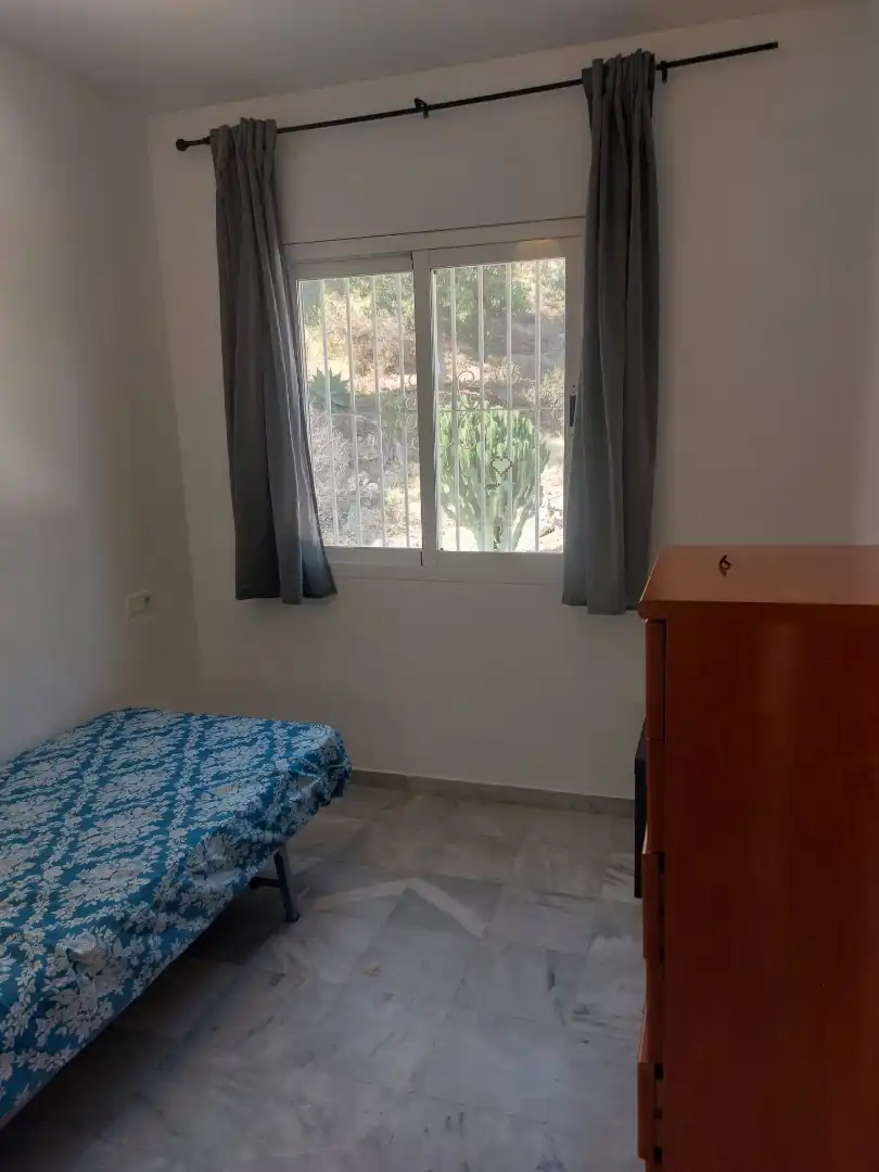 Habitación de Casa adosada de alquiler en Benalmádena con Aire acondicionado, Terraza y Amueblado