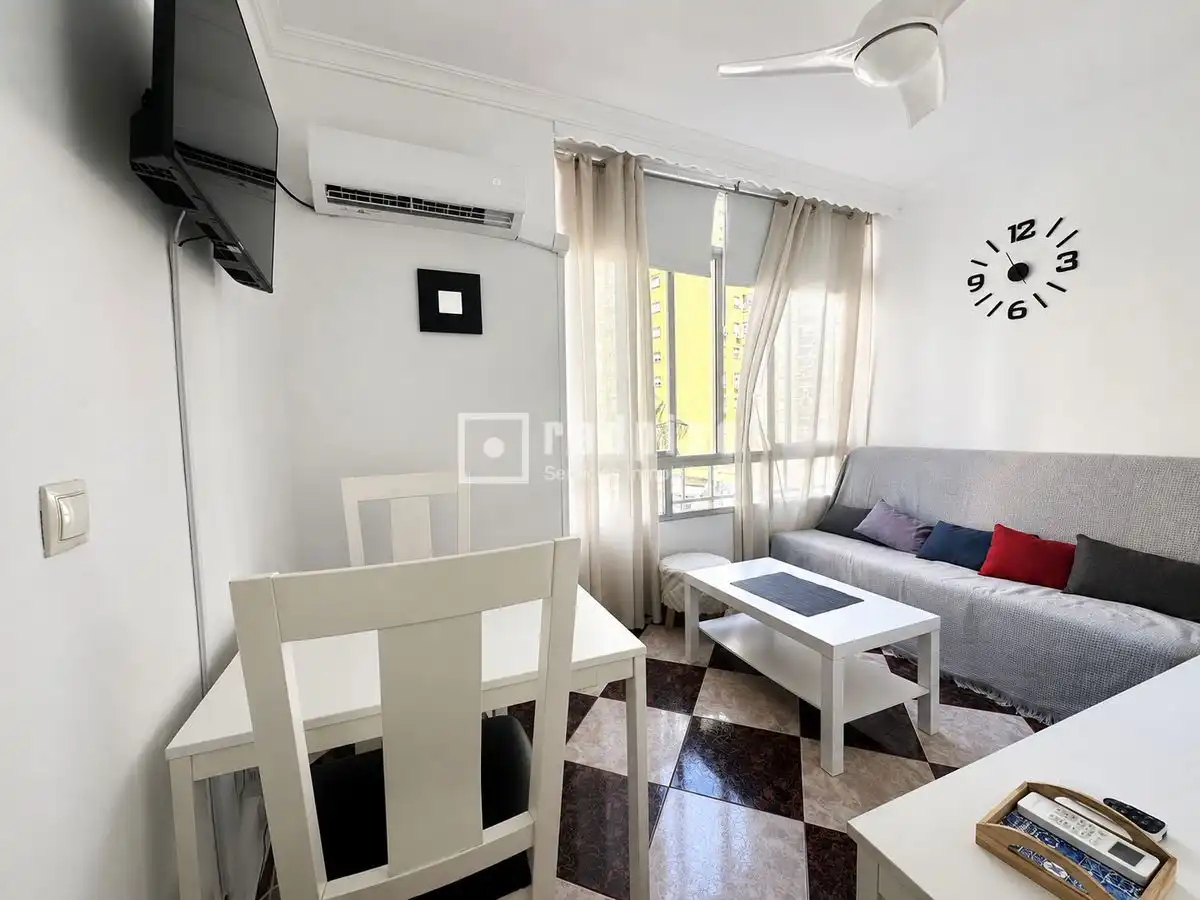 Living room of Flat for rent in Torremolinos  with Air Conditioner, Private garden and Swimming Pool