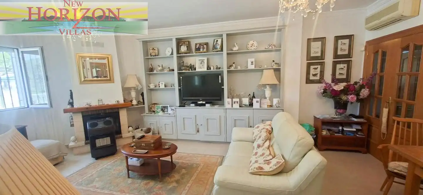 Sala d'estar de Casa o xalet en venda en Arboleas amb Jardí privat, Terrassa i Piscina