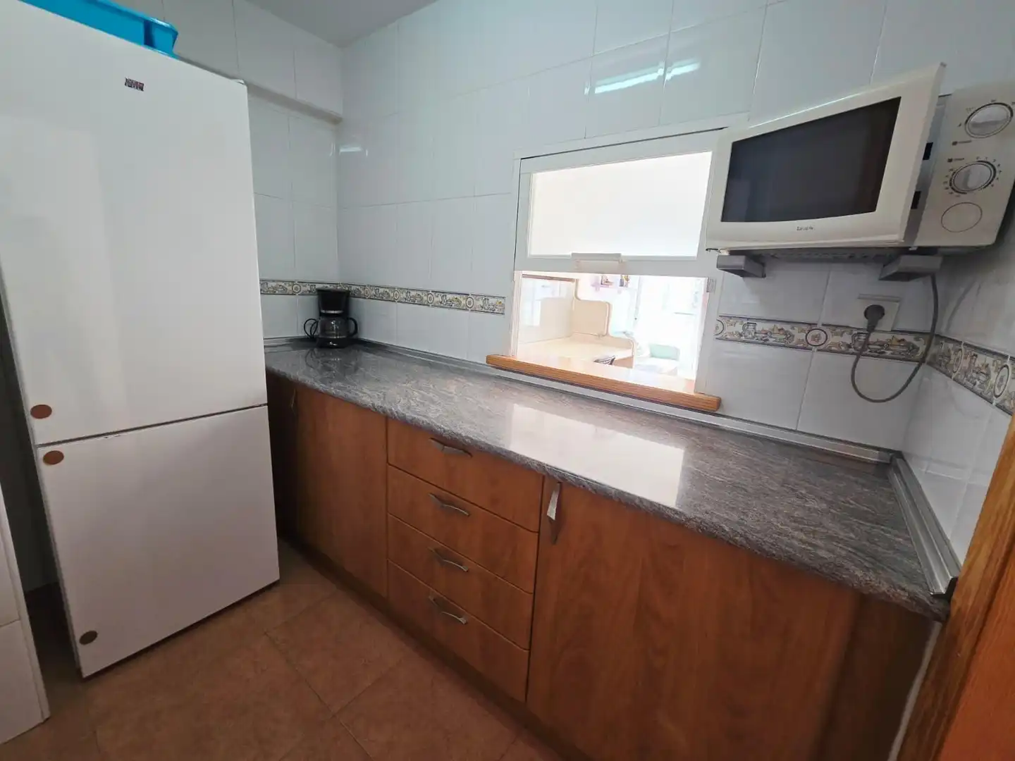 Cuina de Apartament en venda en Benidorm amb Aire condicionat, Moblat i Piscina comunitària