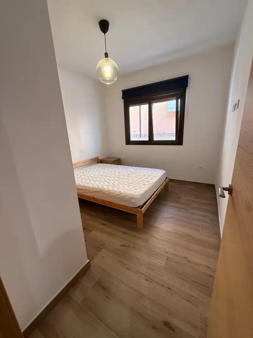 Dormitori de Apartament de lloguer en Málaga amb Aire condicionat, Terrassa i Moblat