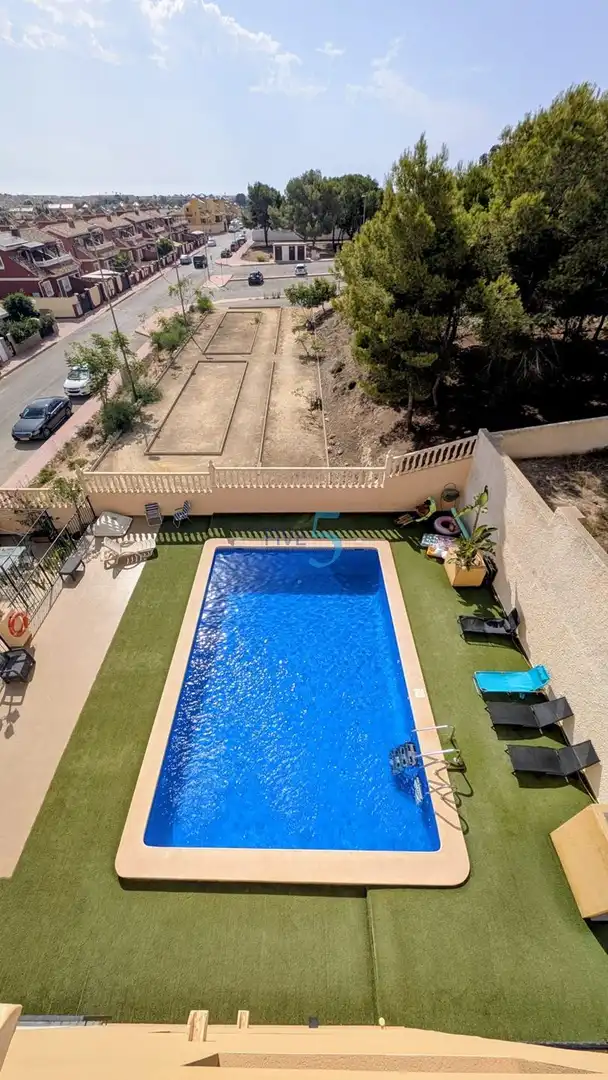 Swimming pool of Flat for sale in Orihuela  with Air Conditioner, Heating and Storage room