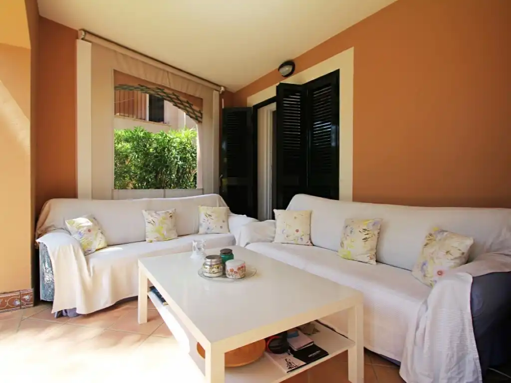 Sala d'estar de Apartament en venda en Calvià amb Aire condicionat, Jardí privat i Terrassa