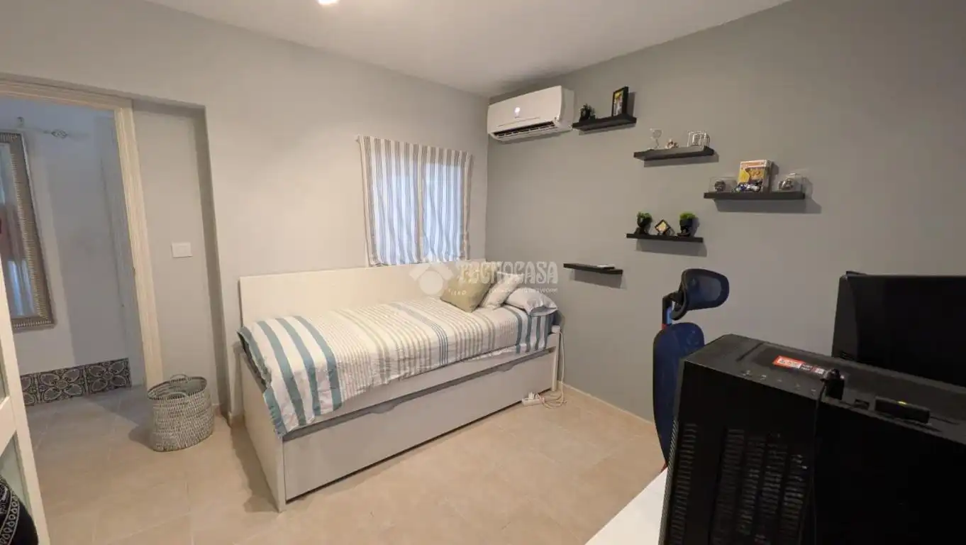 Habitación de Casa adosada en venta en Marchena