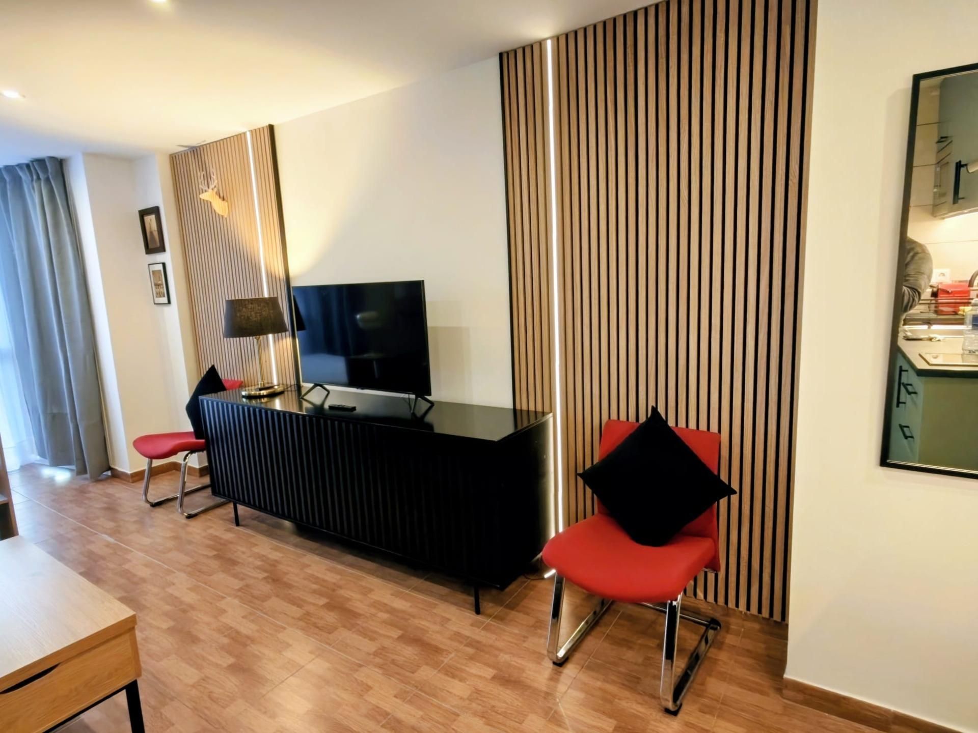 Sala d'estar de Estudi de lloguer en Torremolinos amb Aire condicionat i Moblat