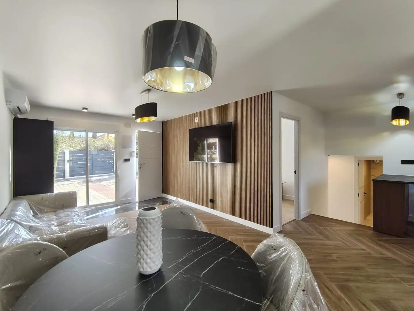 Sala de estar de Casa adosada en venta en La Nucia con Aire acondicionado, Calefacción y Jardín privado