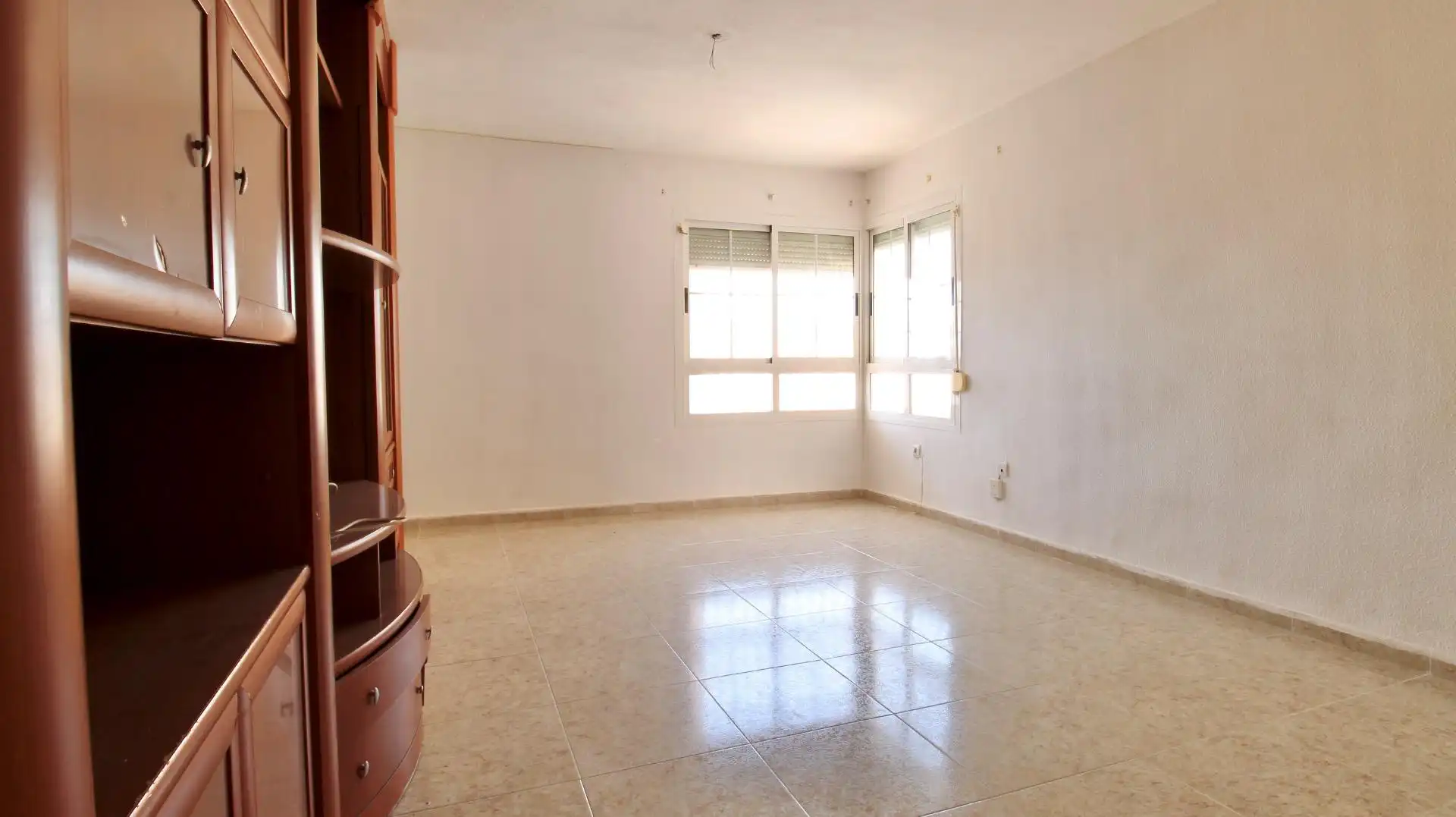 Sala d'estar de Casa adosada en venda en Roquetas de Mar amb Terrassa i Piscina comunitària