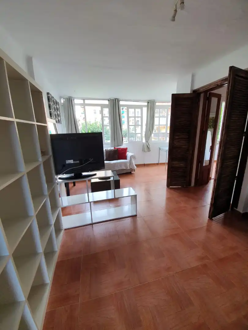 Sala d'estar de Apartament de lloguer en Torremolinos amb Moblat i Piscina comunitària