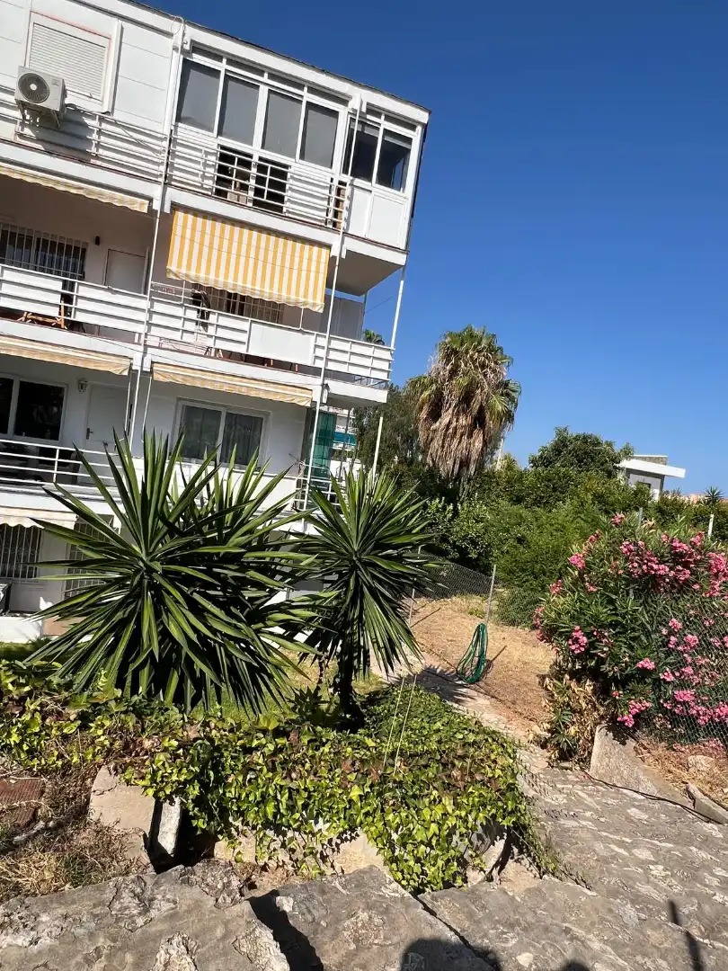 Außenansicht von Wohnung zum Verkauf in Benalmádena mit Klimaanlage, Privatgarten und Terrasse