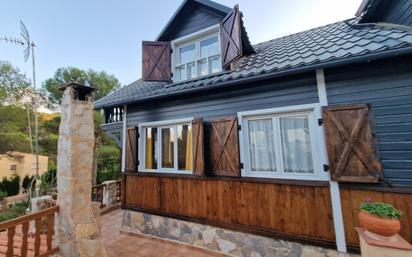 Vista exterior de Casa o xalet en venda en Gilet amb Aire condicionat, Jardí privat i Terrassa