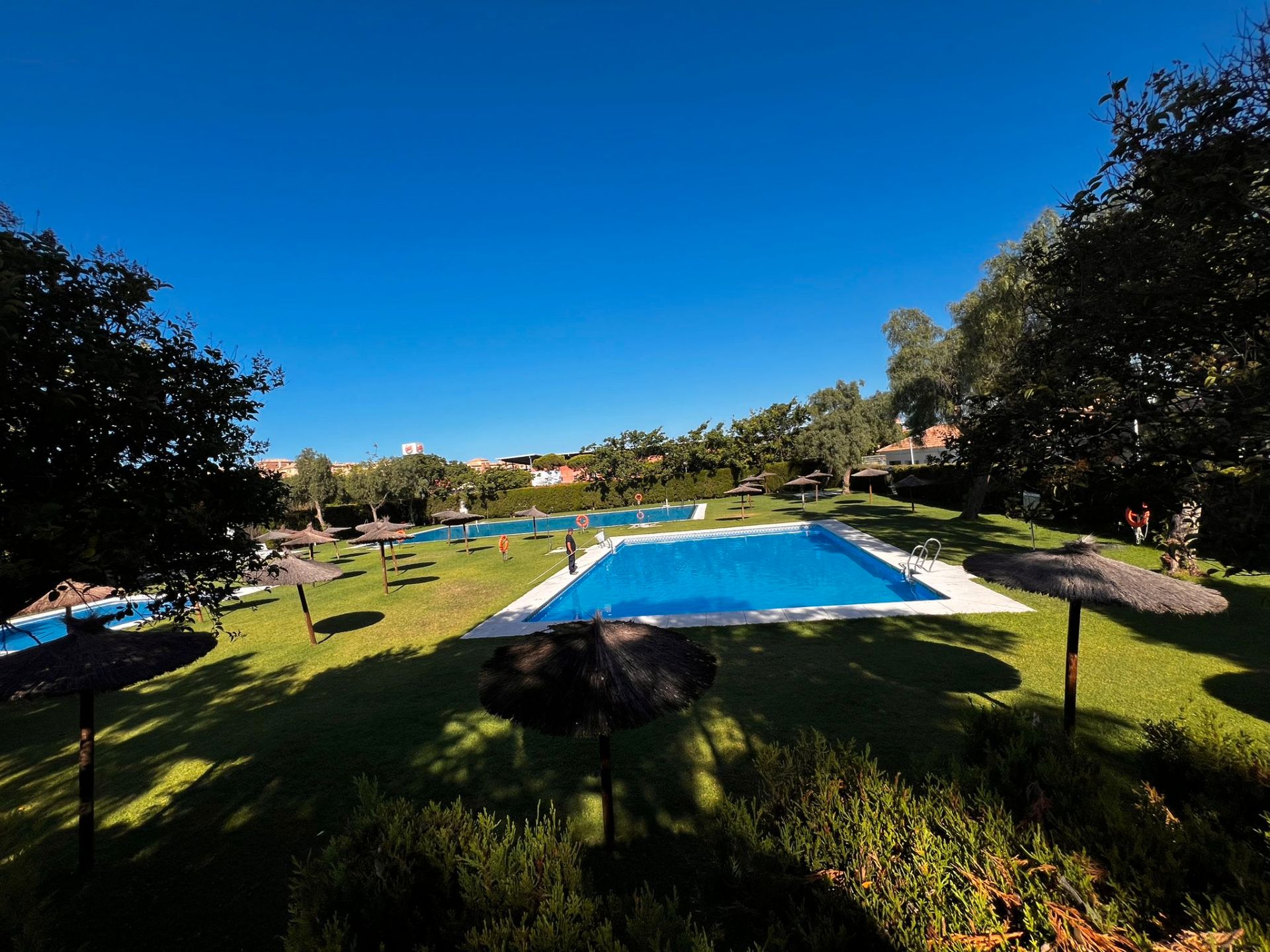 Swimming pool of Single-family semi-detached for sale in Punta Umbría  with Air Conditioner, Heating and Private garden