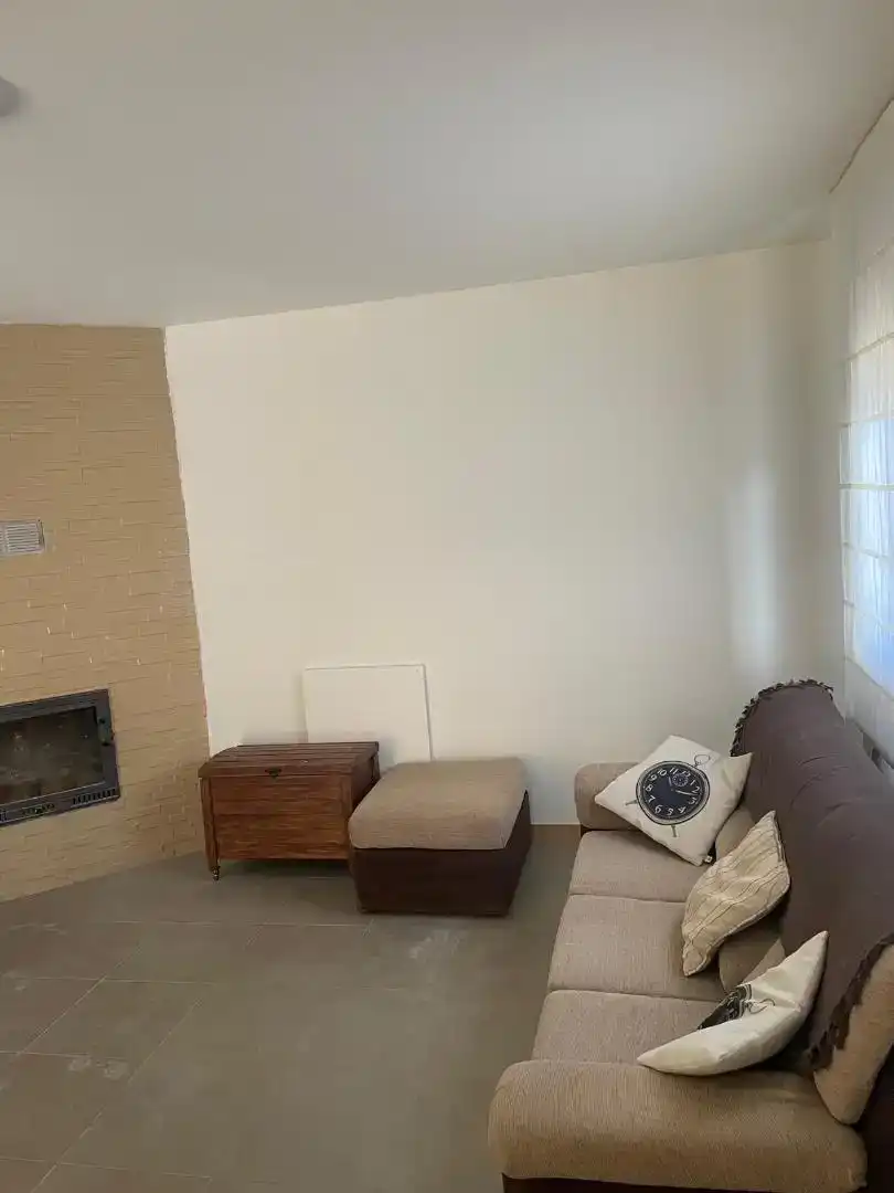 Sala de estar de Planta baja en venta en Huérmeces con Parquet y Amueblado