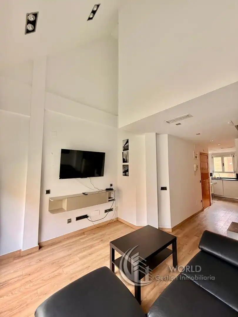 Wohnzimmer von Dachboden zum Verkauf in Madrid mit Klimaanlage, Heizung und Terrasse