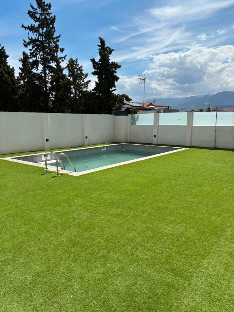 Swimming pool of Flat for sale in Armilla  with Air Conditioner, Heating and Parquet flooring