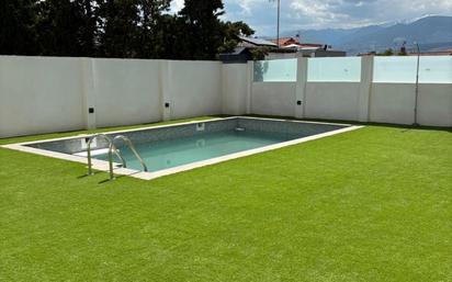 Swimming pool of Flat for sale in Armilla  with Air Conditioner, Heating and Parquet flooring
