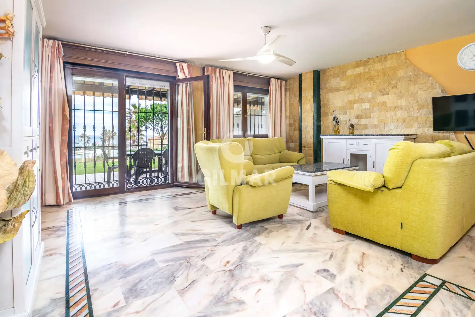 Garten von Einfamilien-Reihenhaus zum Verkauf in Manilva mit Heizung, Privatgarten und Schwimmbad