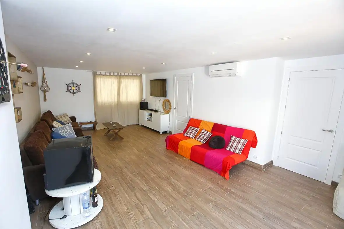 Sala de estar de Casa adosada en venta en Alcanar con Calefacción, Jardín privado y Terraza