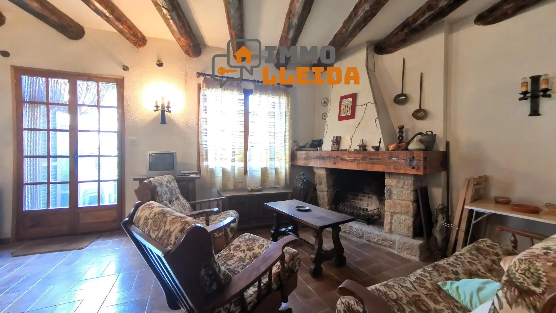 Sala de estar de Casa adosada en venta en Àger con Calefacción, Terraza y Amueblado