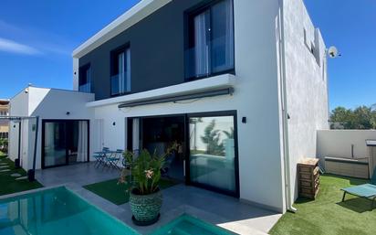 Exterior view of Single-family semi-detached for sale in Empuriabrava  with Air Conditioner, Heating and Private garden