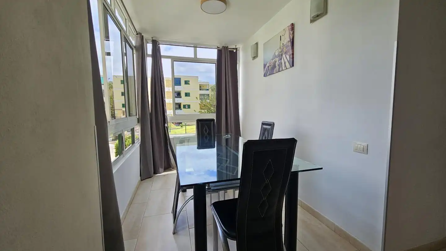 Dining room of Flat for sale in San Bartolomé de Tirajana  with Air Conditioner, Furnished and Community pool