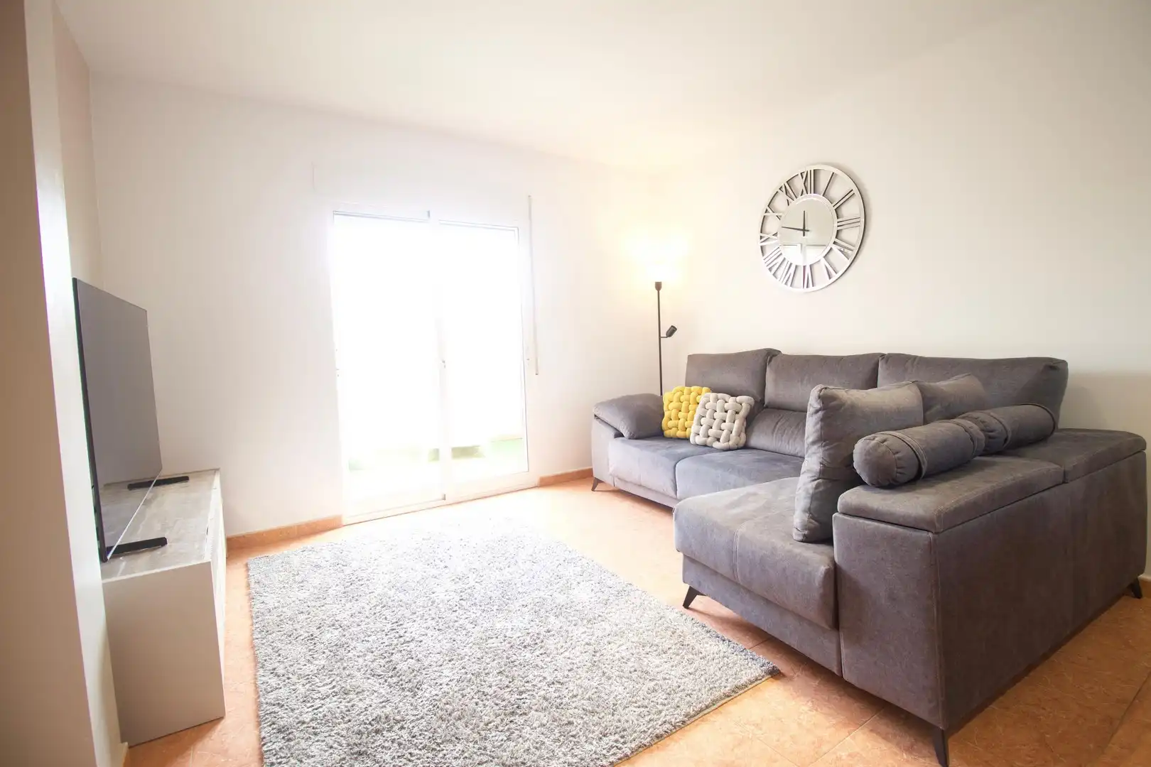 Wohnzimmer von Einfamilien-Reihenhaus zum Verkauf in Fuente Álamo de Murcia mit Privatgarten und Balkon