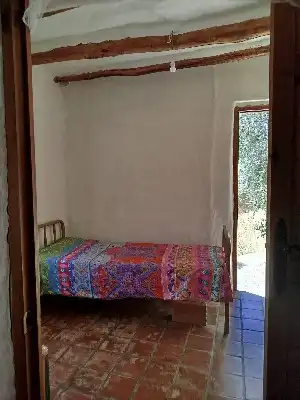 Dormitori de Finca rústica en venda en Alpujarra de la Sierra amb Calefacció, Jardí privat i Moblat