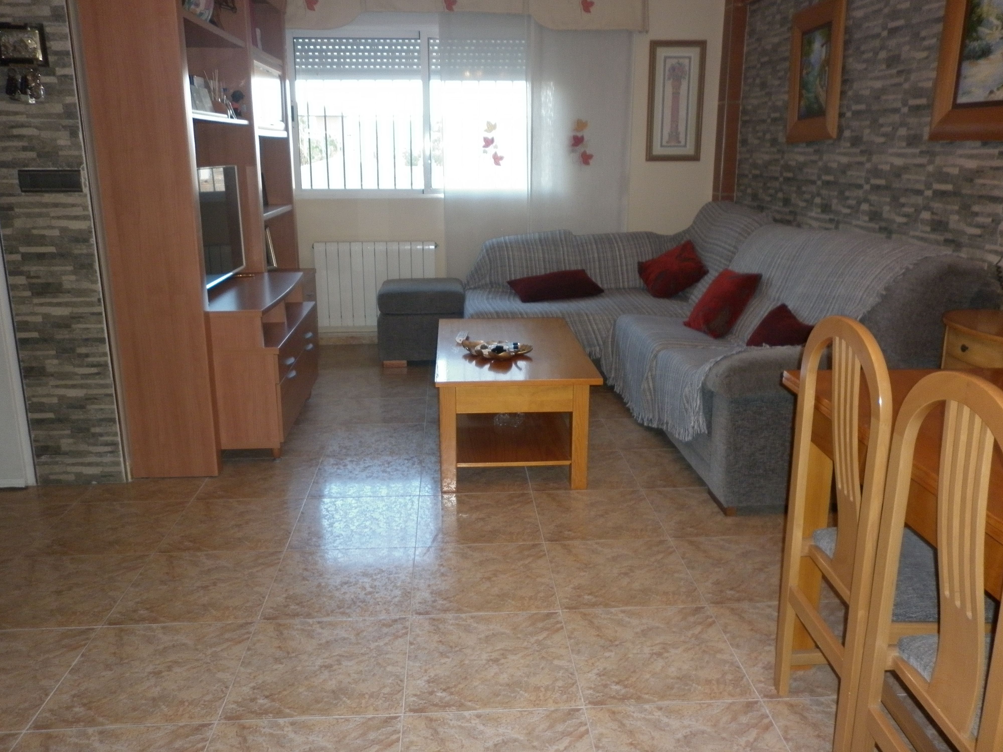 Sala d'estar de Casa adosada en venda en Lorca amb Terrassa, Balcó i Piscina comunitària