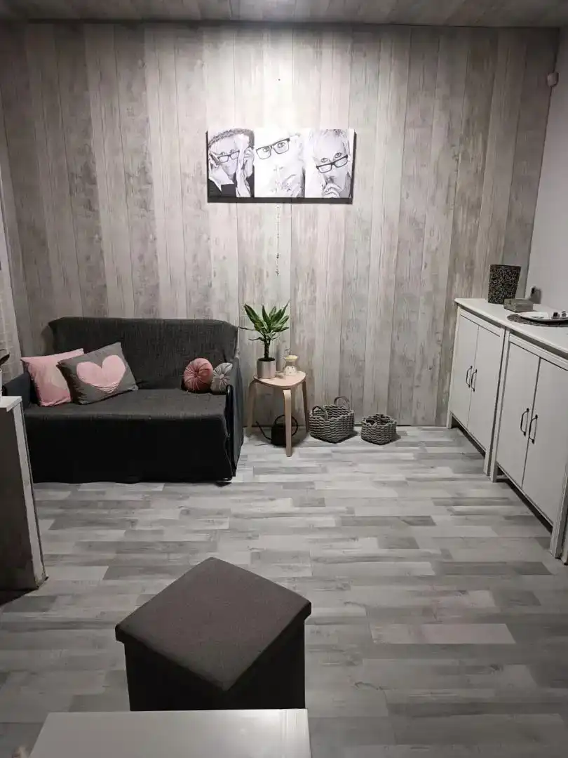 Sala d'estar de Casa adosada en venda en Escatrón amb Aire condicionat, Jardí privat i Moblat