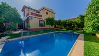 Swimming pool of House or chalet for sale in Espartinas  with Air Conditioner, Terrace and Swimming Pool