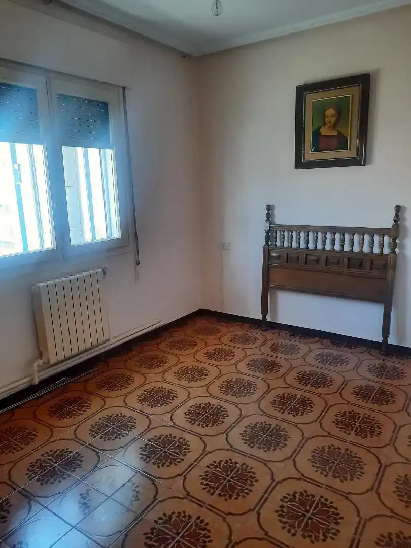 Sala d'estar de Casa adosada en venda en Corella amb Jardí privat, Traster i Forn