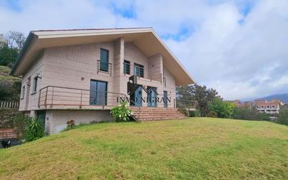 Vista exterior de Casa o xalet en venda en Moaña amb Calefacció, Jardí privat i Terrassa