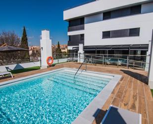 Swimming pool of Flat to rent in  Granada Capital  with Air Conditioner, Heating and Community pool