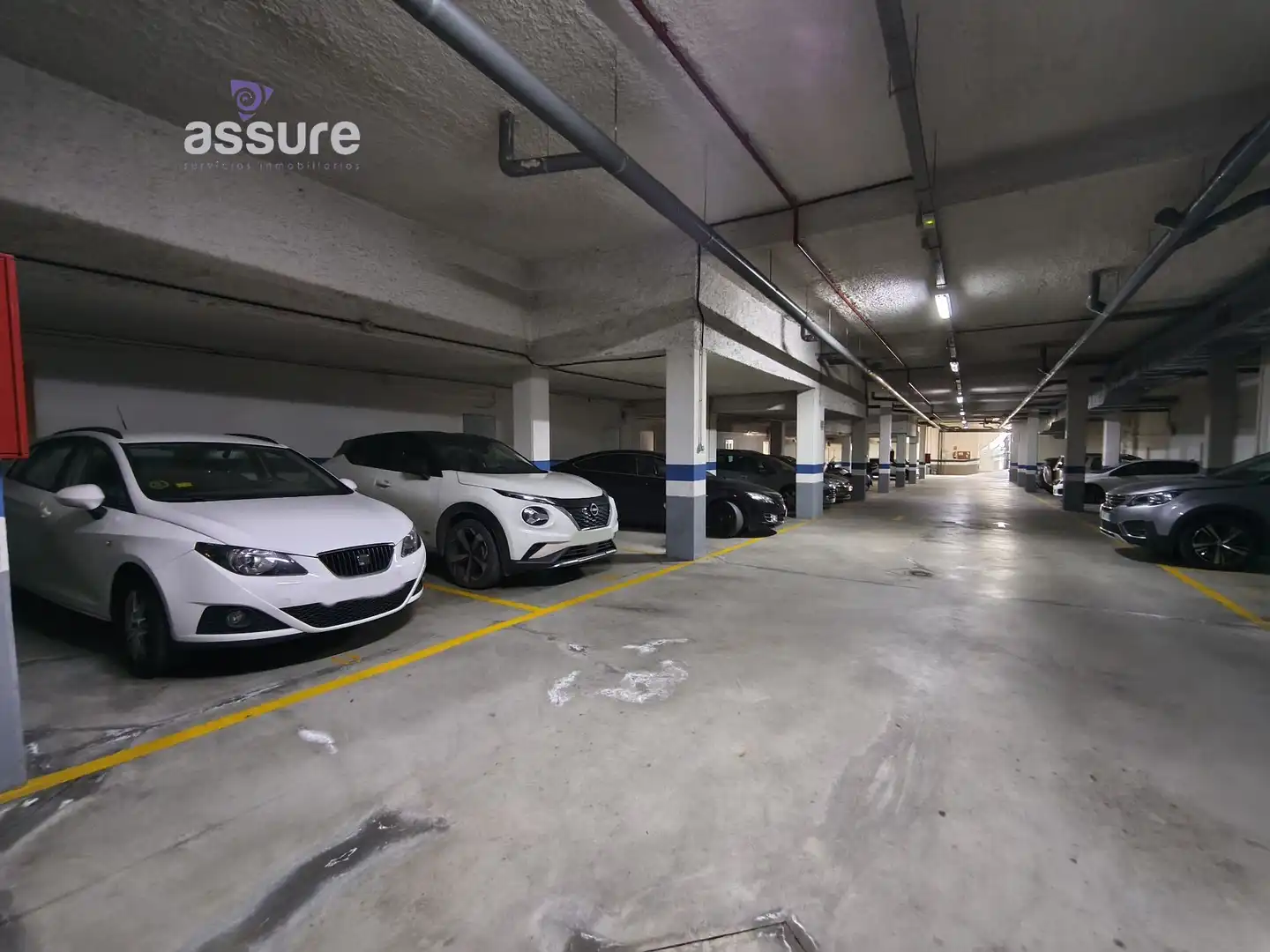 Parking de Casa adosada en venta en Huelva con Aire acondicionado, Calefacción y Jardín privado