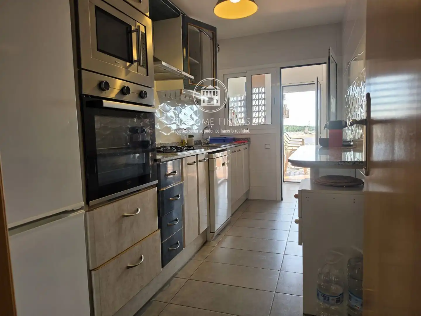 Kitchen of Flat for sale in Roda de Berà  with Terrace, Swimming Pool and Community pool
