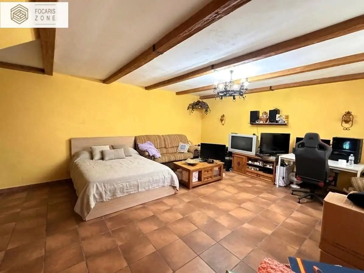 Sala de estar de Casa adosada en venta en Málaga con Aire acondicionado, Calefacción y Terraza
