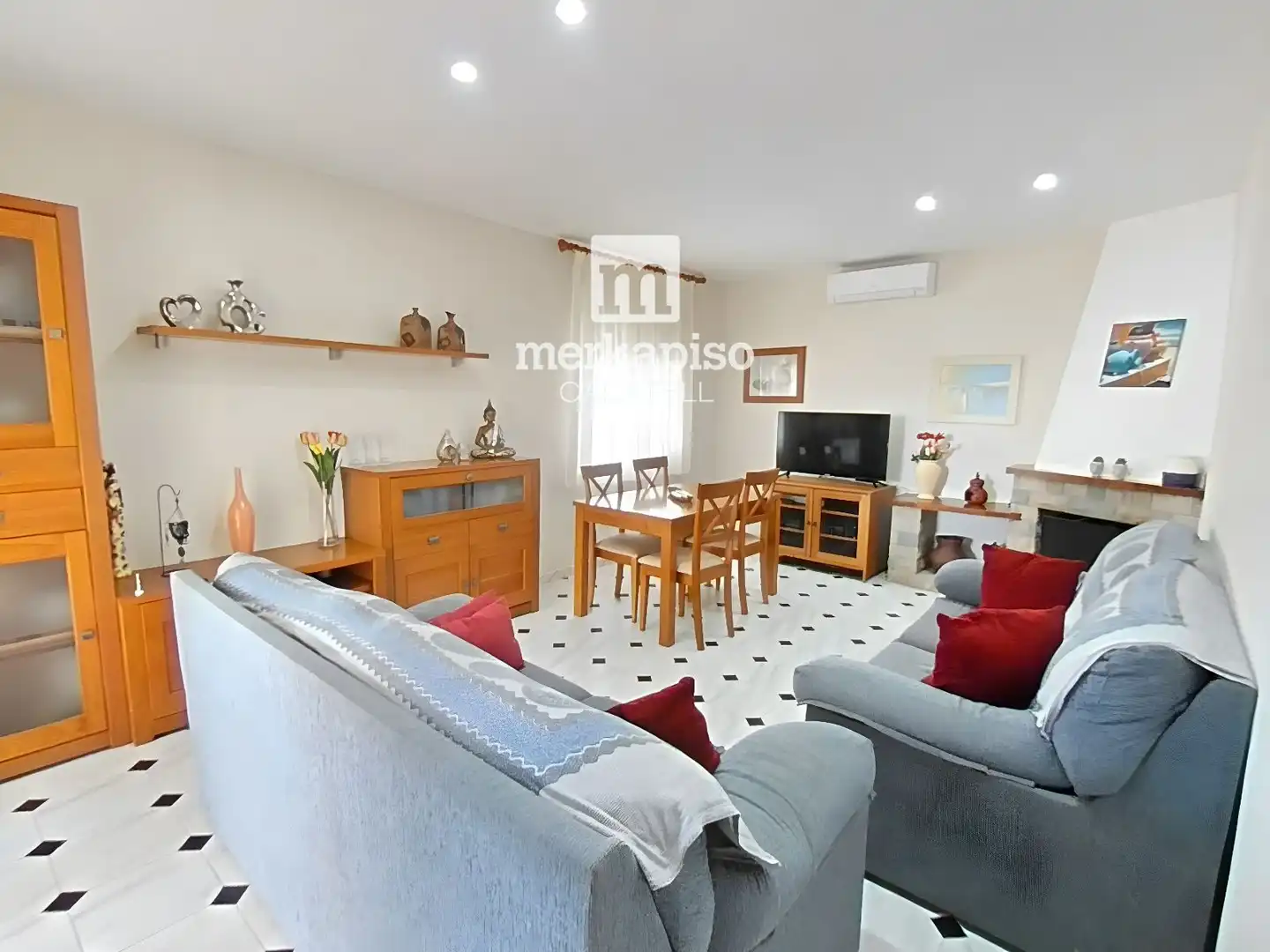 Sala de estar de Casa adosada en venta en Cunit Residencial