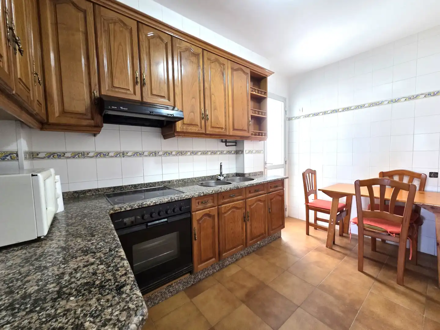 Kitchen of Flat for sale in Sanxenxo  with Parquet flooring, Terrace and Oven