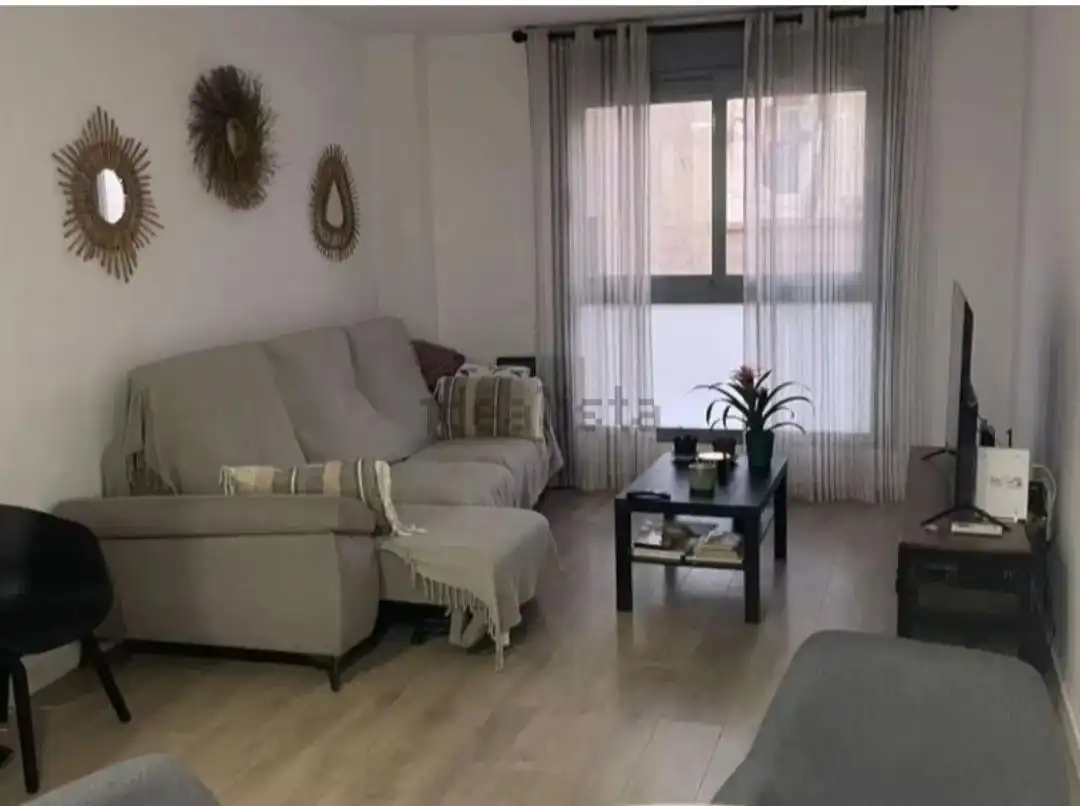 Sala d'estar de Pis de lloguer en Almería amb Aire condicionat i Moblat