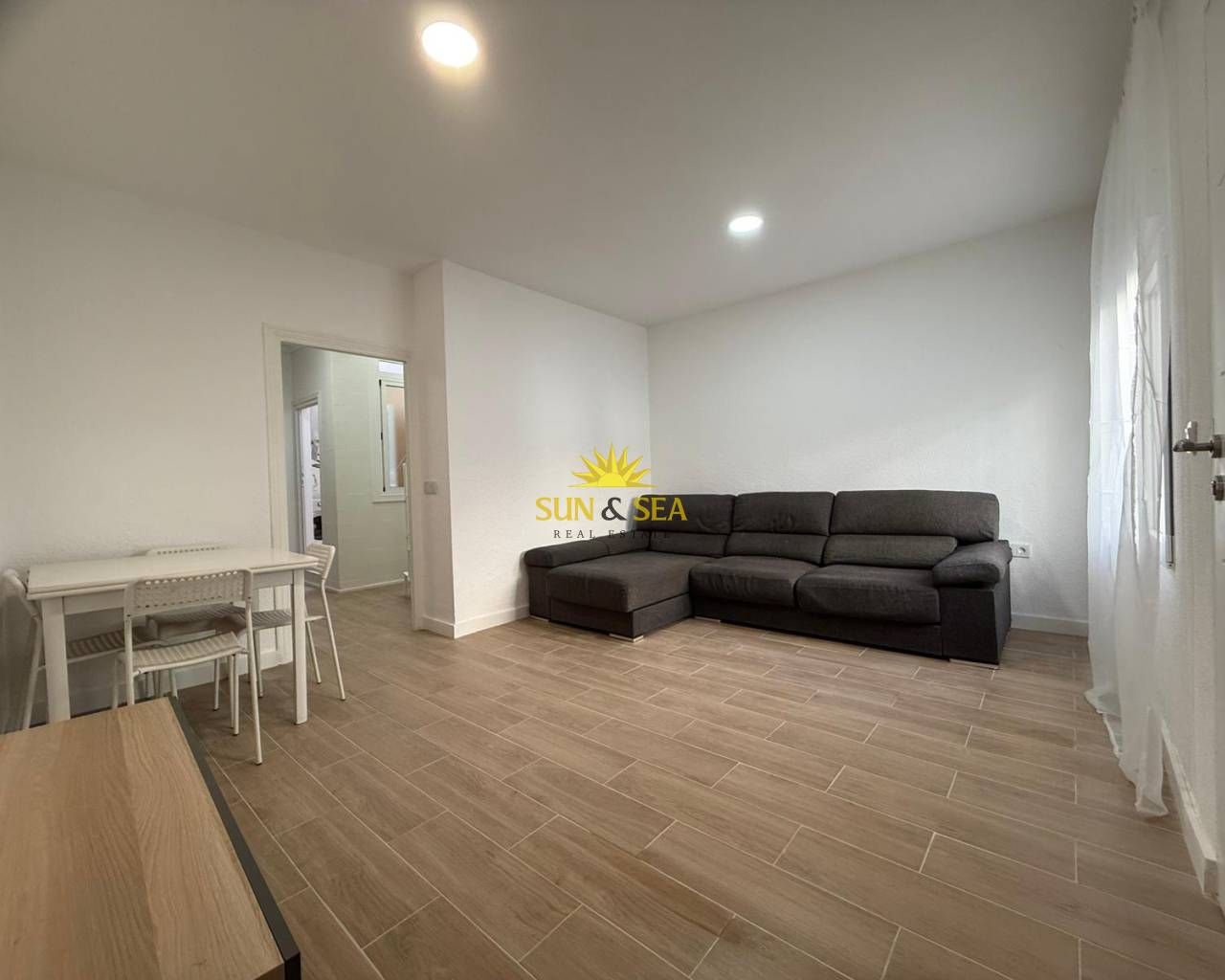 Living room of Planta baja to rent in Torrevieja  with Heating, Parquet flooring and Terrace