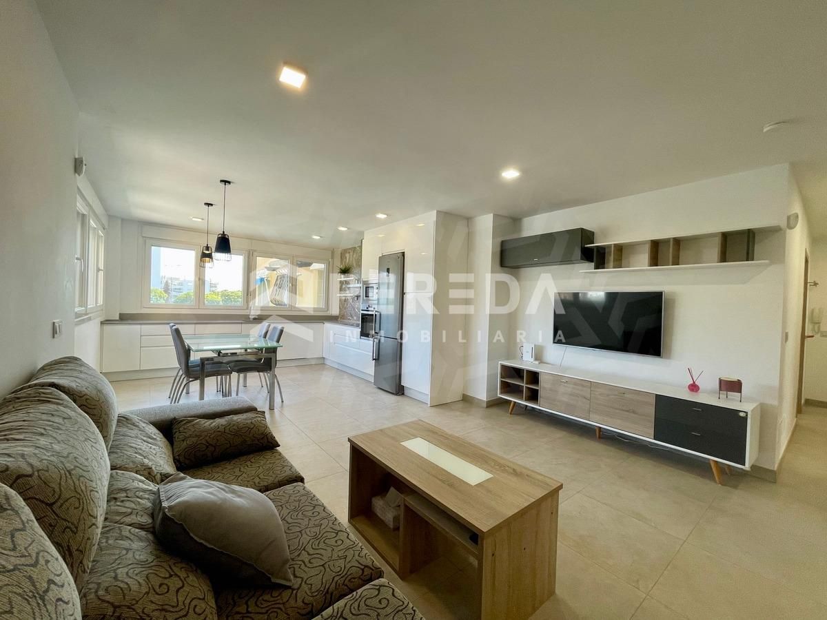 Living room of Apartment for sale in Roquetas de Mar  with Air Conditioner, Private garden and Terrace