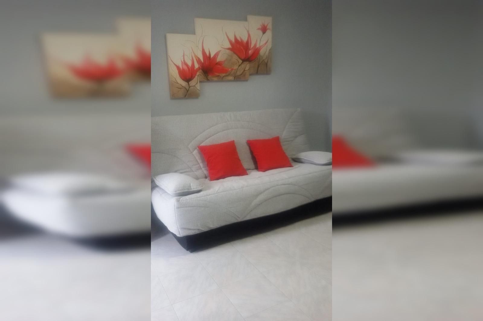 Sala d'estar de Estudi en venda en Benalmádena amb Aire condicionat, Jardí privat i Moblat