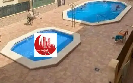 Swimming pool of Flat for sale in Los Alcázares