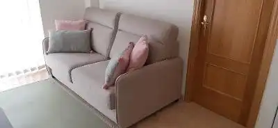 Wohnzimmer von Wohnungen zur Miete in Gozón mit Heizung